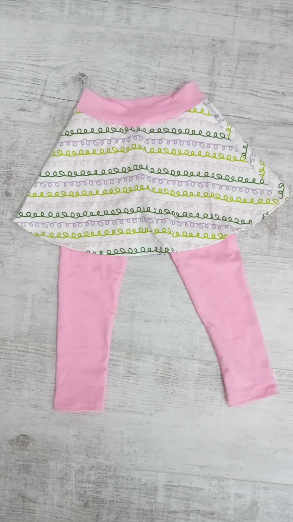 Rózsaszín szoknyás-leggings 104